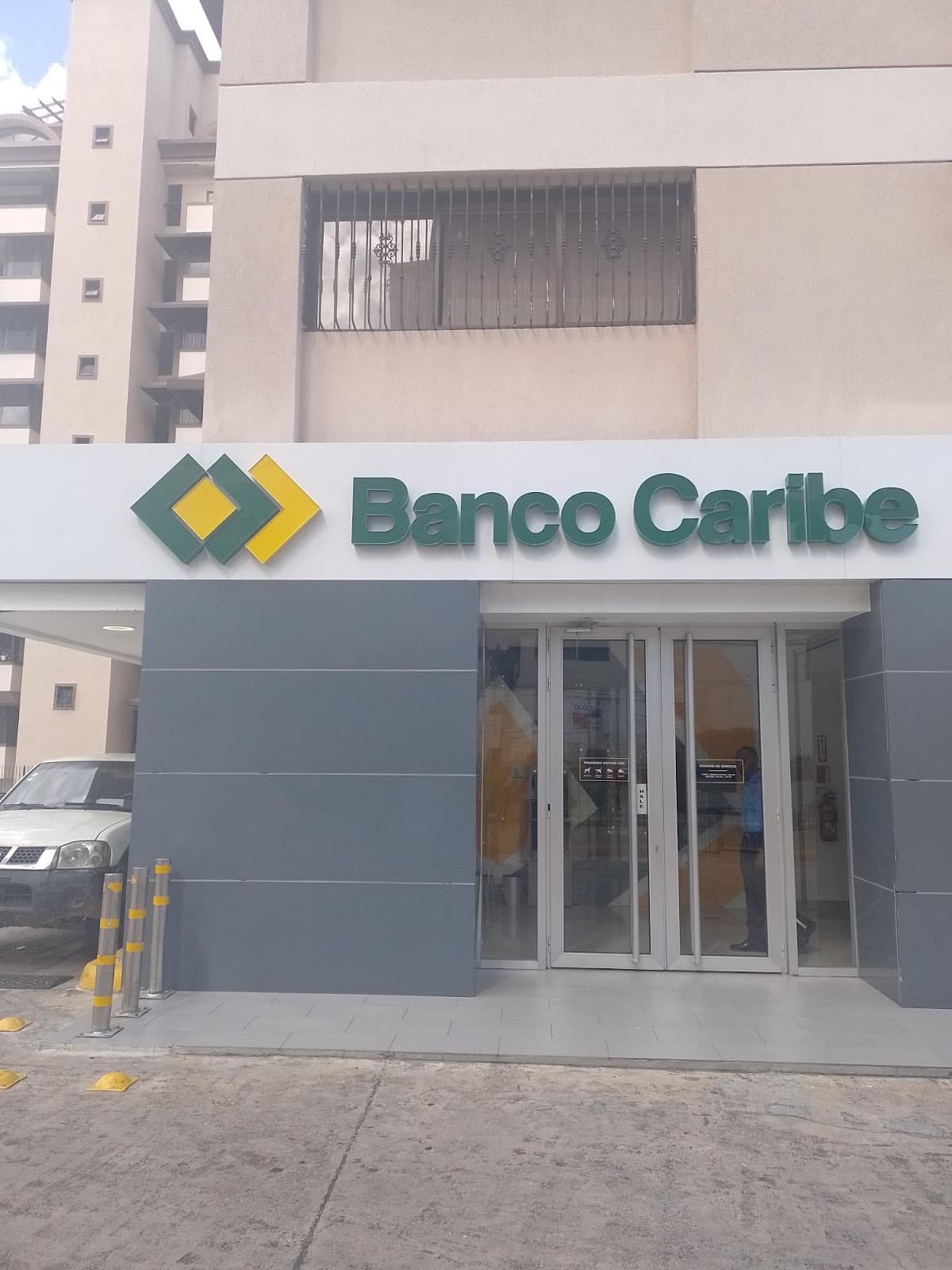 Banco Caribe — Luis Amiama Tio