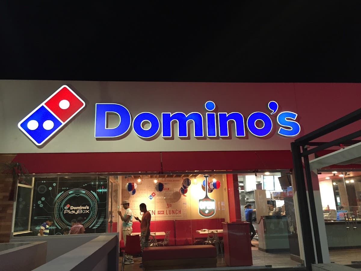 Domino's — Pizza • Patio Colombia